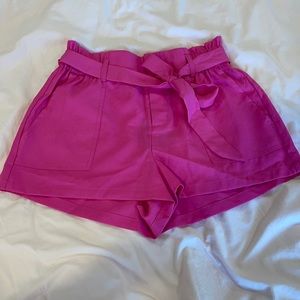High waisted pink shorts with pockets